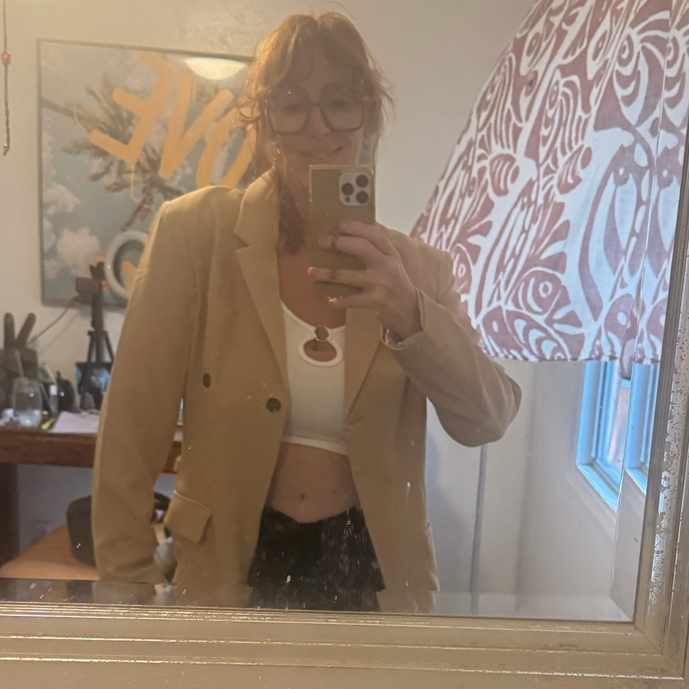Adorable new without tags blazer. Super cute on. Def for cooler weather. Size L